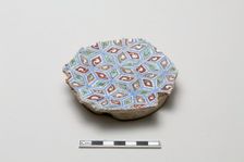 Fragmentary base of a bowl with with abstracted all-over design, early 13th century. Creator: Unknown