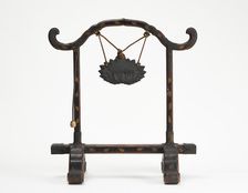 Frame for a gong with a bronze gong suspended by a cord; mallet hanging, Edo period, 1615-1868. Creator: Unknown