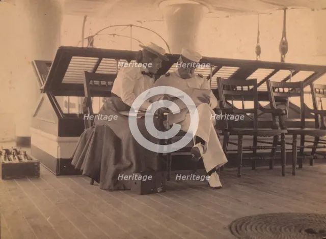 Frances B. Johnston and Admiral Dewey on the deck of the U.S.S. Olympia, 1899. Creator: Unknown.