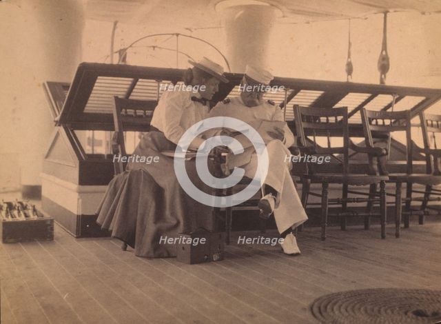 Frances B. Johnston and Admiral Dewey on the deck of the U.S.S. Olympia, 1899. Creator: Unknown.