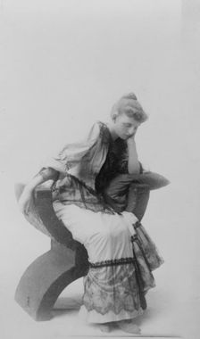 Frances Benjamin Johnston, full-length portrait, seated, facing left, looking..., c1880 - 1890. Creator: Unknown