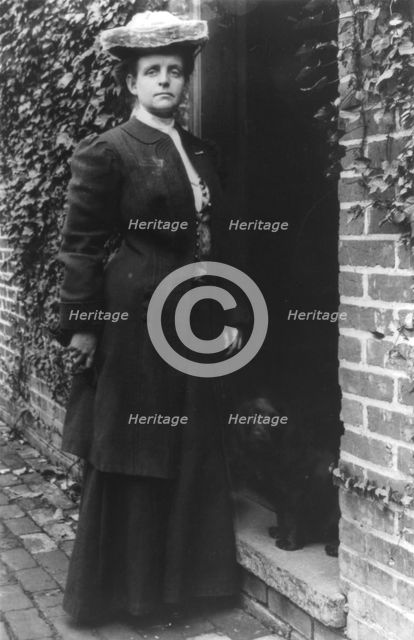 Frances Benjamin Johnston, in doorway with cocker spaniel, n.d.. Creator: Frances Benjamin Johnston.
