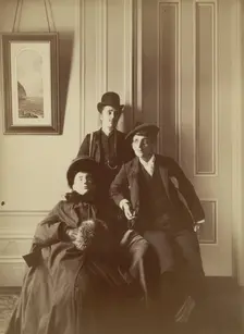 Frances Benjamin Johnston (right), full-length self-portrait dressed as a man with..., c1880 - 1900. Creator: Frances Benjamin Johnston