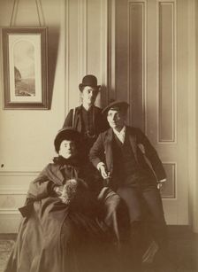 Frances Benjamin Johnston (right), full-length self-portrait dressed as a man with..., c1880 - 1900. Creator: Frances Benjamin Johnston