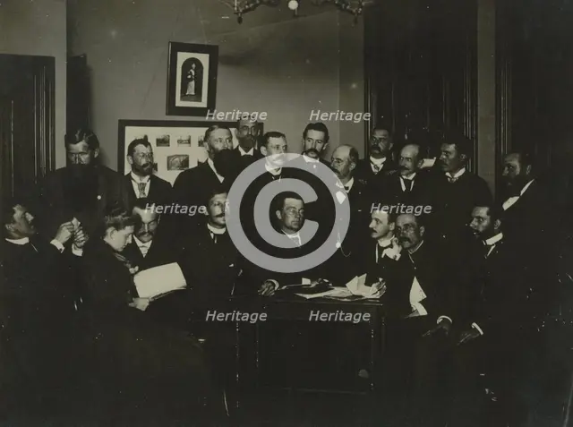 Frances Benjamin Johnston, seated in profile at left, group portrait with 18..., c1880 - 1900. Creator: Frances Benjamin Johnston.