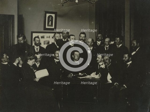 Frances Benjamin Johnston, seated in profile at left, group portrait with 18..., c1880 - 1900. Creator: Frances Benjamin Johnston.