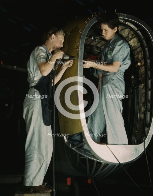 Frances Eggleston, aged 23, came from Oklahoma...Consolidated Aircraft Corp., Fort Worth, TX, 1942. Creator: Howard Hollem.