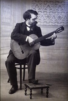Francisco Tárrega Eixea (1852-1909), guitarist and composer, portrait playing guitar