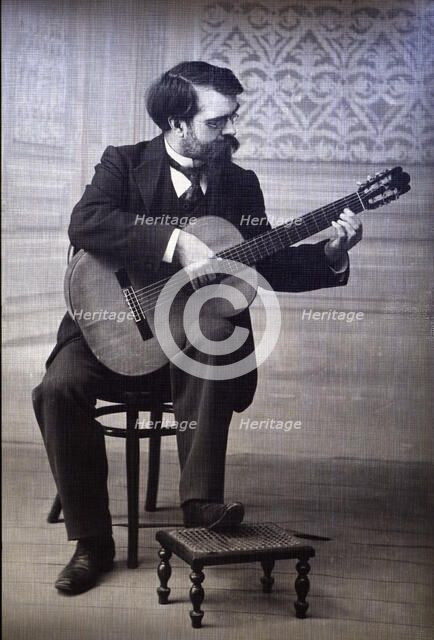 Francisco Tárrega Eixea (1852-1909), guitarist and composer, portrait playing guitar.