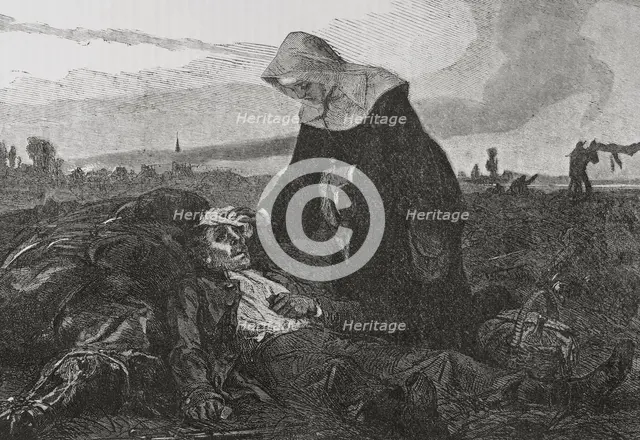 Franco-Prussian War (1870-71): Sisters of Charity on the battlefield, tending to the wounded, 1870.  Creator: Unknown.