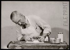 Frank Earl Holden Demonstrates Cutting into Mineral, January 18, 1951. Creator: United States National Museum Photographic Laboratory