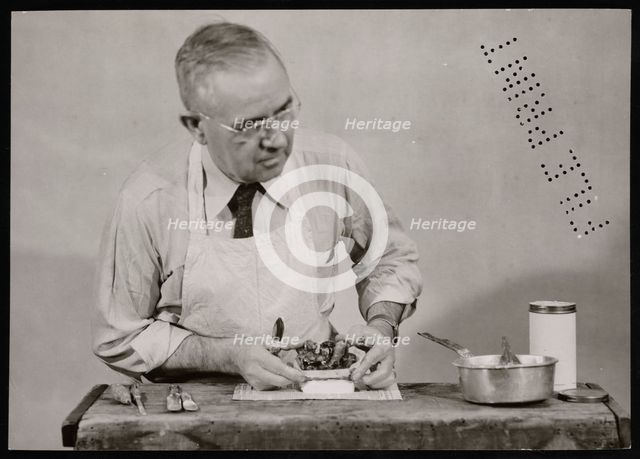 Frank Earl Holden Demonstrates Cutting into Mineral, January 18, 1951. Creator: United States National Museum Photographic Laboratory.