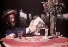 Frank Eugene Seated at Table, 1907. Creator: Alfred Stieglitz