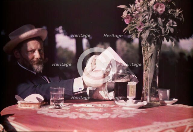 Frank Eugene Seated at Table, 1907. Creator: Alfred Stieglitz.