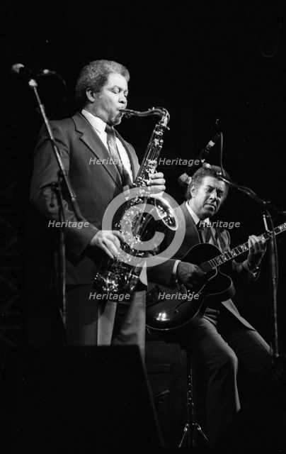 Frank Foster and Kenny Burrell, Dominion Theatre, London, Nov 1985. Creator: Brian O'Connor.