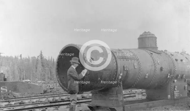 Frank G. Carpenter inspecting new railroad, between c1900 and 1916. Creator: Unknown.