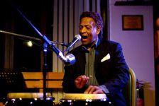 Frank Holder, Guyanan jazz singer and percussionist, Jazz Hastings, Hastings, East Sussex. Artist: Brian O'Connor