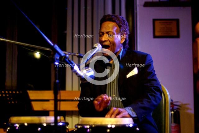 Frank Holder, Guyanan jazz singer and percussionist, Jazz Hastings, Hastings, East Sussex.  Artist: Brian O'Connor