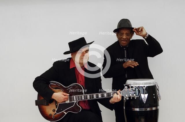 Frank Holder, Guyanan jazz singer and percussionist with Shane Hill, guitarist.   Artist: Brian O'Connor