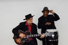 Frank Holder, Guyanan jazz singer and percussionist with Shane Hill, guitarist. Artist: Brian O'Connor