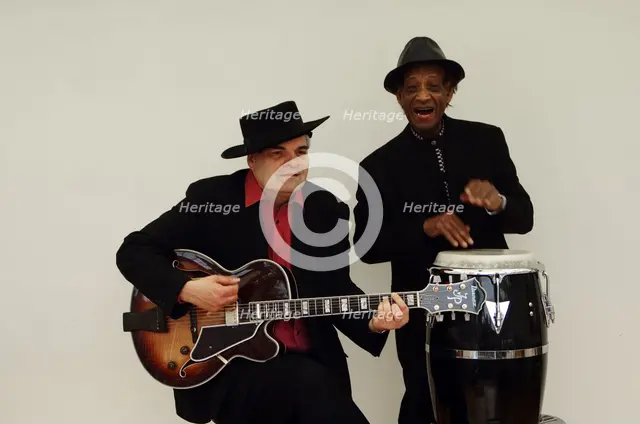 Frank Holder, Guyanan jazz singer and percussionist with Shane Hill, guitarist.   Artist: Brian O'Connor