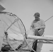 Frank Mineo, owner and skipper of the New England fishing boat..., Gloucester, Massachusetts, 1943. Creator: Gordon Parks