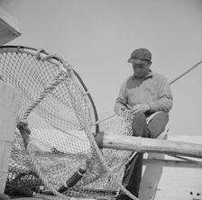 Frank Mineo, owner and skipper of the New England fishing boat..., Gloucester, Massachusetts, 1943. Creator: Gordon Parks