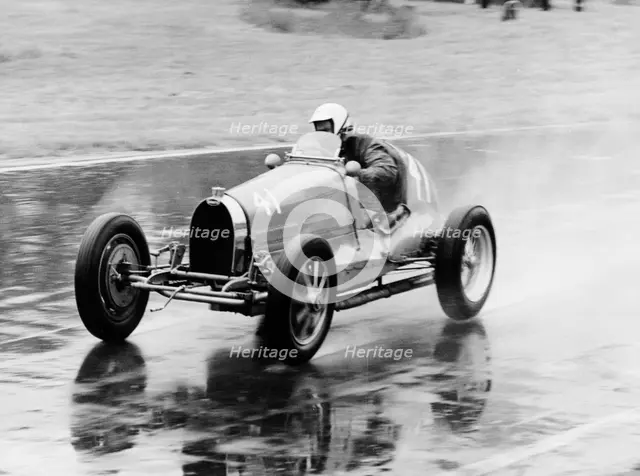 Frank Wall driving a Bugatti Type 35B, 1926. Artist: Unknown