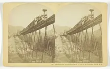 Frankenstein Trestle and Train, P. & O. R.R. Crawford Notch, N.H., late 19th century. Creator: BW Kilburn