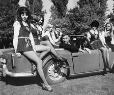 Frankie Howerd and some of the girls from St Trinian's at Shepperton Studios, Surrey, c1966. Creator: Unknown