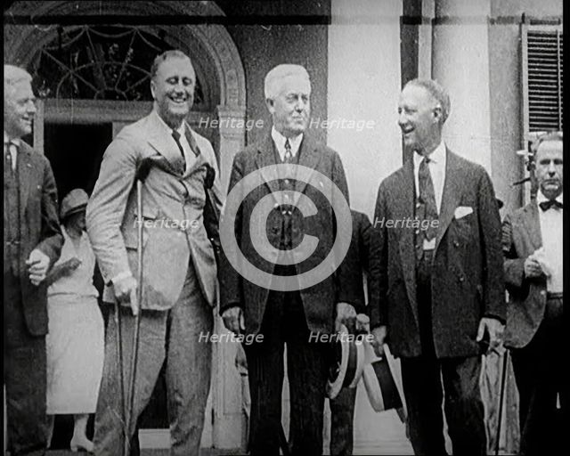 Franklin D. Roosevelt Stands on Crutches Besides Democrat Al Smith and Another Man, 1924. Creator: British Pathe Ltd.
