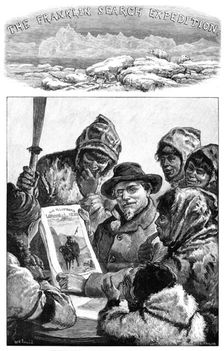 Franklin Search Expedition - Lt Schwatka Showing the esquimaux the "Illustrated London News", 1881. Creator: R&E Taylor