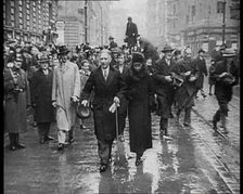 Franz von Papen Walking Towards Camera Surrounded by a Crowd, 1933. Creator: British Pathe Ltd