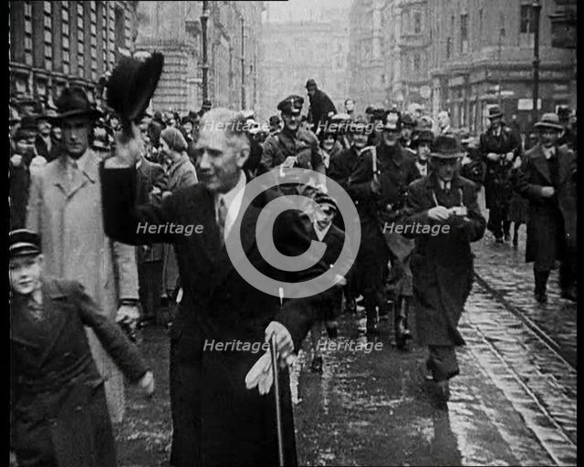 Franz von Papen Walking Towards Camera Surrounded by a Crowd, 1933. Creator: British Pathe Ltd.