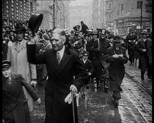 Franz von Papen Walking Towards Camera Surrounded by a Crowd, 1933. Creator: British Pathe Ltd