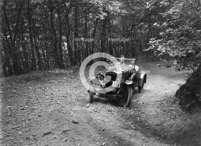 Frazer-Nash competing in the Brighton & Hove Motor Club Brighton-Beer Trial, 1934. Artist: Bill Brunell.