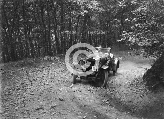 Frazer-Nash competing in the Brighton & Hove Motor Club Brighton-Beer Trial, 1934. Artist: Bill Brunell.