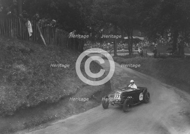 Frazer-Nash competing in the Shelsley Walsh Hillclimb, Worcestershire, 1935. Artist: Bill Brunell.