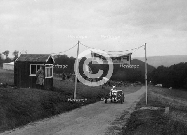 Frazer-Nash crossing the finishing line, MAC Shelsley Walsh Speed Hill Climb, Worcestershire, 1935. Artist: Bill Brunell.