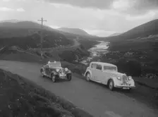 Frazer-Nash BMW 319/55 of E Violet Watson passing Bill Brunell's Standard, Scottish Rally, 1938. Artist: Bill Brunell