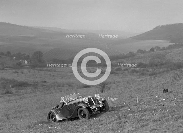 Frazer-Nash BMW 319 competing in the London Motor Club Coventry Cup Trial, Knatts Hill, Kent, 1938. Artist: Bill Brunell.