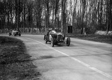 Frazer-Nash Byfleet II leading an MG at Donington Park, Leicestershire, 1935. Artist: Bill Brunell