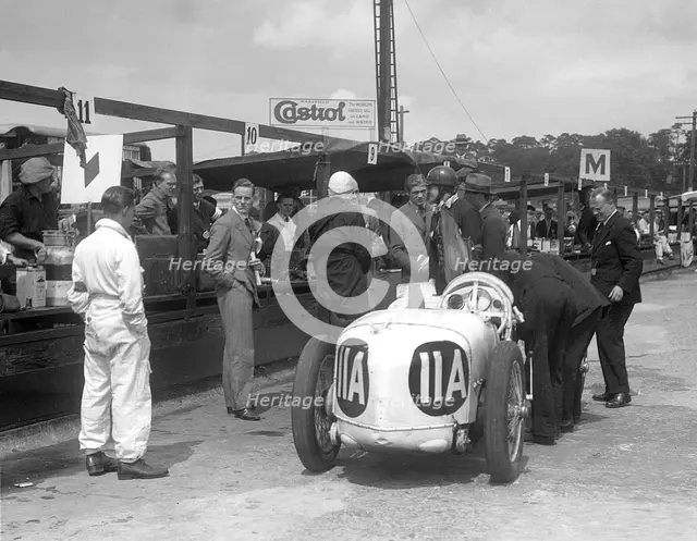 Frazer-Nash of Adrian Malcolm Conan-Doyle at the LCC Relay GP, Brooklands, 25 July 1931. Artist: Bill Brunell.