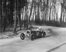 Frazer-Nash of PF Jucker leading J Eason-Gibson's Riley Brooklands, Donington Park, 1933. Artist: Bill Brunell