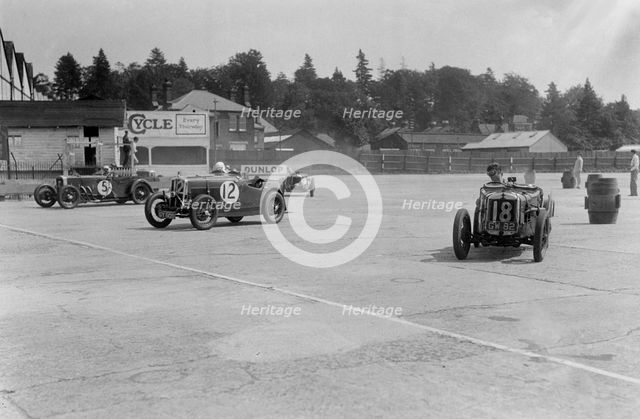 Frazer-Nash, Wolseley Hornet and Riley 9 Brooklands, BARC meeting, Brooklands, Surrey, 1933. Artist: Bill Brunell.