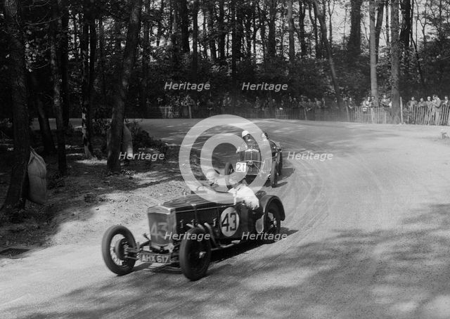 Frazer-Nash TT replica leading a Wolseley Hornet at Donington Park, Leicestershire, 1930s. Artist: Bill Brunell.