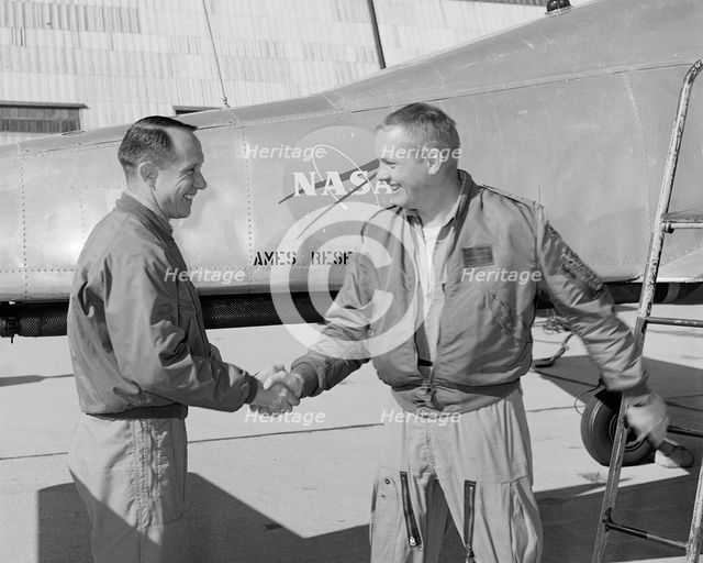Fred Drinkwater congratulating Neil Armstrong, California, USA, February 1964.  Creator: Lee Jones.