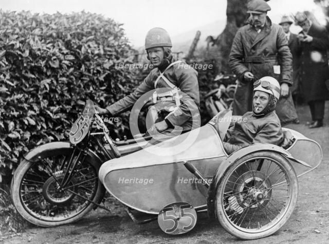 Freddie Dixon and passenger Walter Denny, Isle of Man sidecar TT race, 1923. Artist: Unknown