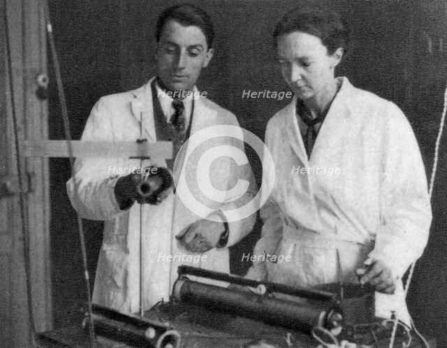 Frederic Joliot and Irene Joliot-Curie, French scientists, 1935. Artist: Unknown
