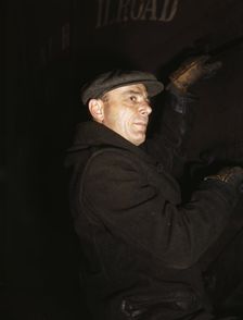 Frederick Batt, brakeman, on the C & NW RR, at Proviso yard, Chicago, Ill., 1942. Creator: Jack Delano